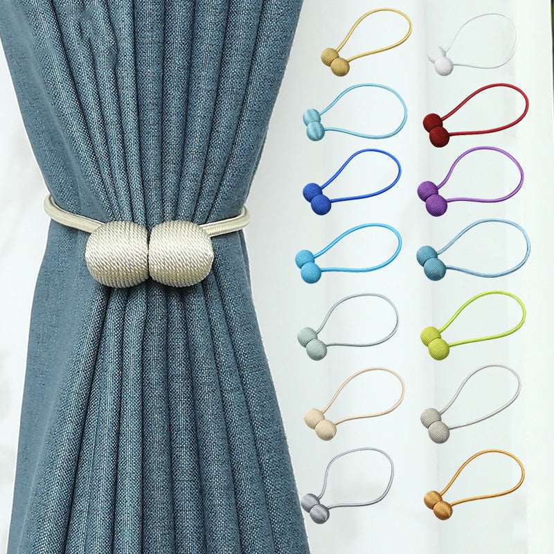 Magnetic curtain holders.